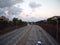 Cars move along H-1 Highway at dusk in Kaimuki