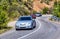 Cars Moves along a winding road in the mountains