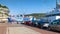 Cars with ordinary people waiting ferry boarding