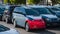 cars parked in row on outdoor parking