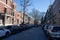 Cars parked on a street surrounded by towering buildings in New York, United States