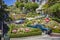 Cars passing the Lombard street in San Francisco. It is  known for the  section on Russian Hill between Hyde and Leavenworth, in