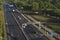 Cars passing on a modern highway in the outskirts of Madrid, Spain.