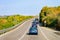 Cars on road in Costa Smeralda in Sardinia Island