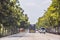 Cars running overtaking trucks on rural roads in the midst of trees and hot weather at thailand - April 16, 2019