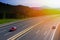 Cars rushing along a high-speed highway in the sun, city of San Sebastian