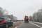 Cars and special purpose vehicle for wet waste disposal on an autobahn, Germany