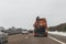 Cars and special purpose vehicle for wet waste disposal on an autobahn, Germany