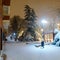 Cars and streets covered in snow in night image of Filomena storm fall in Madrid Spain. Europe