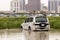 Cars stuck in water in a flooded parking lot after heavy in rain in Dubai