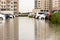 Cars stuck in water in a flooded parking lot after heavy in rain in Dubai