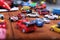 Cars toys on a wooden background