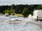 Cars trying to drive against flood on the street in Gdansk, Poland.