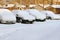 Cars under snow