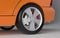 Cars wheel on gray studio background