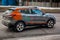 Carsharing car Nissan Qashqai on the street. YouDrive car service per-minute rental with affordable price