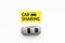 Carsharing concept. Toy car near text car sharing on white background top view space for text