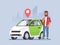 Carsharing. A man with a phone in his hand is standing next to a car. Vehicle rental