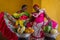 Cartegena, Colombia / December 15, 2015 - Two women proudly display their colorful dresses