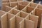 Carton boxes for bottles. Cardboard empty packaging. Waste recycling. Craft Paper parcels.