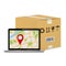 Carton parcel box and laptop with gps map.