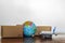 Cartons, airplane and earth globe. International delivery and global logistics concept
