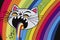 Cartoon of a bored cat yawning with a rainbow coming out of it`s mouth