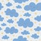 Cartoon childish seamless patterns with clouds, stars, face with smile and blush.