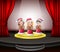 Cartoon children in red santa costume singing christmas carols on the stage