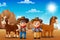 Cartoon cowboy and cowgirl with animals in the desert
