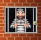 Cartoon criminal in jail