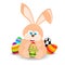 Cartoon easter rabbit holding an easter egg