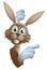 Cartoon Easter rabbit pointing