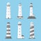 Cartoon flat lighthouses vector set isolated on blue background. Sea pharos or beacon collection