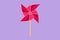 Cartoon flat style drawing stylized paper windmill logo, icon. Origami paper windmill. Playing equipment depicting toy pinwheel.