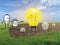 Cartoon Gardener Watering Light Bulbs in a Field