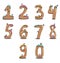 Cartoon gingerbread numbers on white bakcground