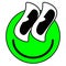 Cartoon Groovy funny green cartoon smile character, vintage. Funky comic bright emoticon stickers