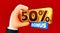 Cartoon hand hold 50 percents bonus. Cashback or prize concept.