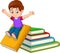 Cartoon little boy playing with large books