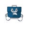 A cartoon picture of business suitcase showing an angry face