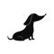 Cartoon sausage dog silhouette - pet dachshund sitting in obedient pose.