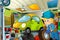 Cartoon scene with garage mechanic working repearing some vehicle - city car - or cleaning work place