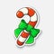 Cartoon sticker with candy cane and ribbon in comic style