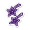 cartoon sticker of ninja throwing stars
