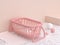 Cartoon style 3d rendering marble floor pink wall baby cradle