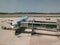 Cartoon style picutre of an airplane connected with jetty in an airport.