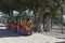 Cartoon train for children on the waterfront near amusement park in the settlement of Adler, Sochi, Krasnodar region, Russia