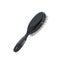 Cartoon trendy style black plastic hair brush for styling. Natural and nylon bristle. Vector professional salon accessory