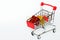 Carts from the supermarket with bright gift boxes. Seasonal and holiday sales. Gifts for birthday, New Year, Christmas and other